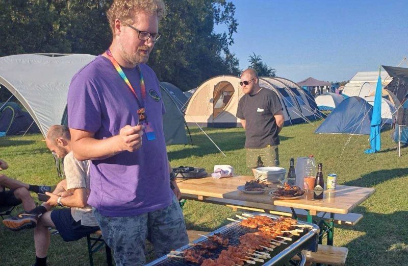 Grilling chicken satay